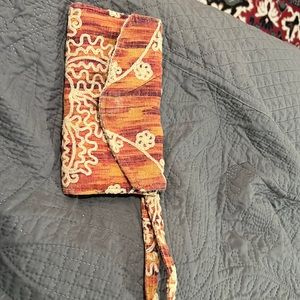 Kindred spirit orange floral clutch